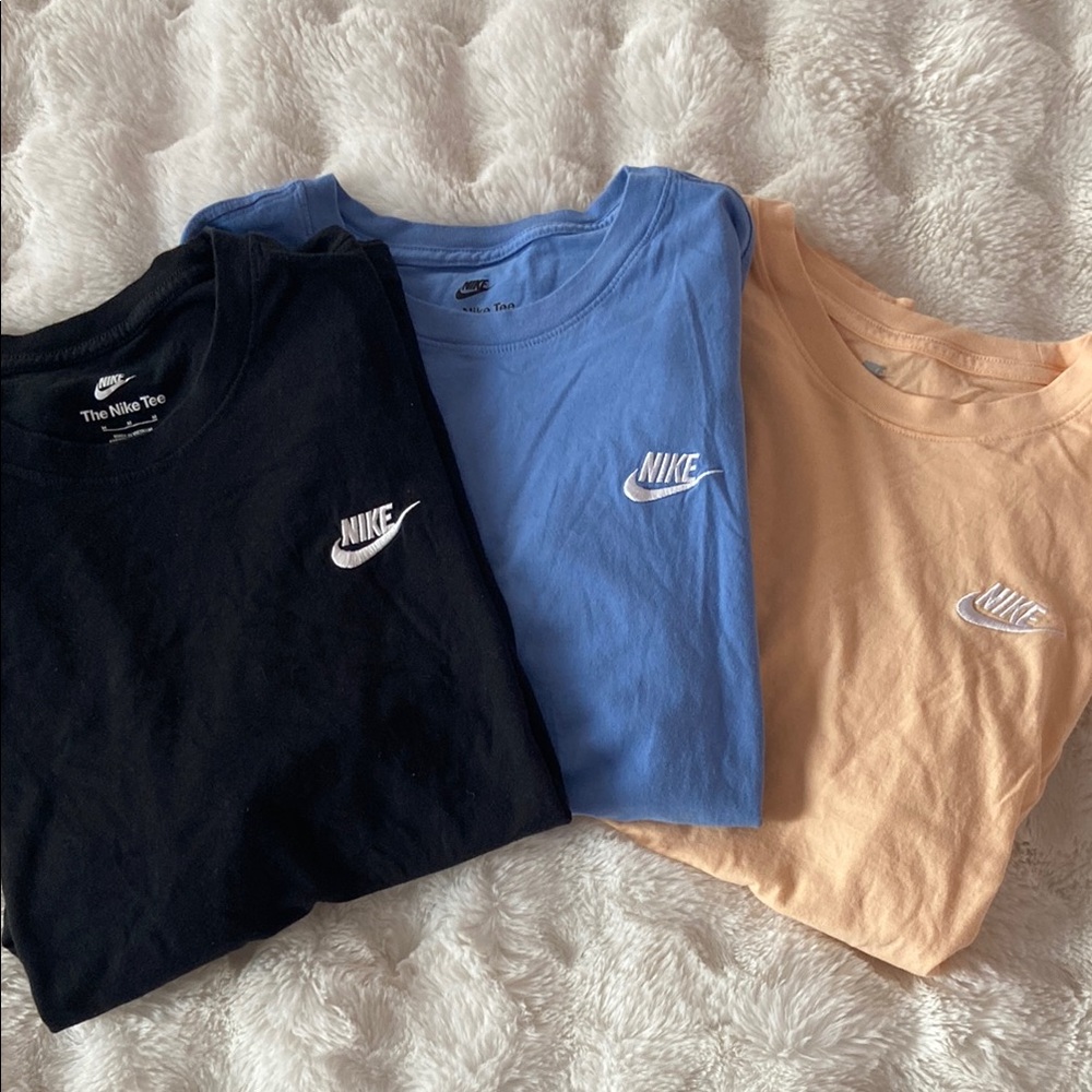 Nike Shirt Trio: Black, Blue, and Peach